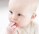 cute infant in a dress