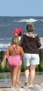 Overweight family on the beach