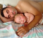 Infant sleeping with Dad