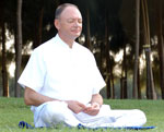 man-meditating outdoors