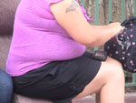 Obese women sitting down
