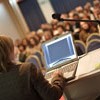Upcoming Training Opportunities For Healthcare Professionals (07-26-10) Women presenting at a professional workshop