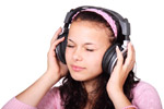 women listening to music in headphones
