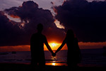 romantic-couple-sunset-stock a married couple on the beach