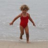 a child running on the beach