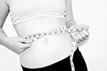 women with measuring tape
